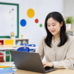 교실에서 노트북으로 AI 교육 자료를 살펴보는 한국인 교사